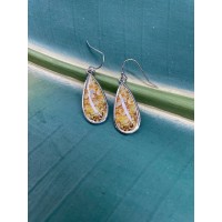 Metal amber colored earrings on fish hook